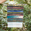 handwoven wall hanging in nature